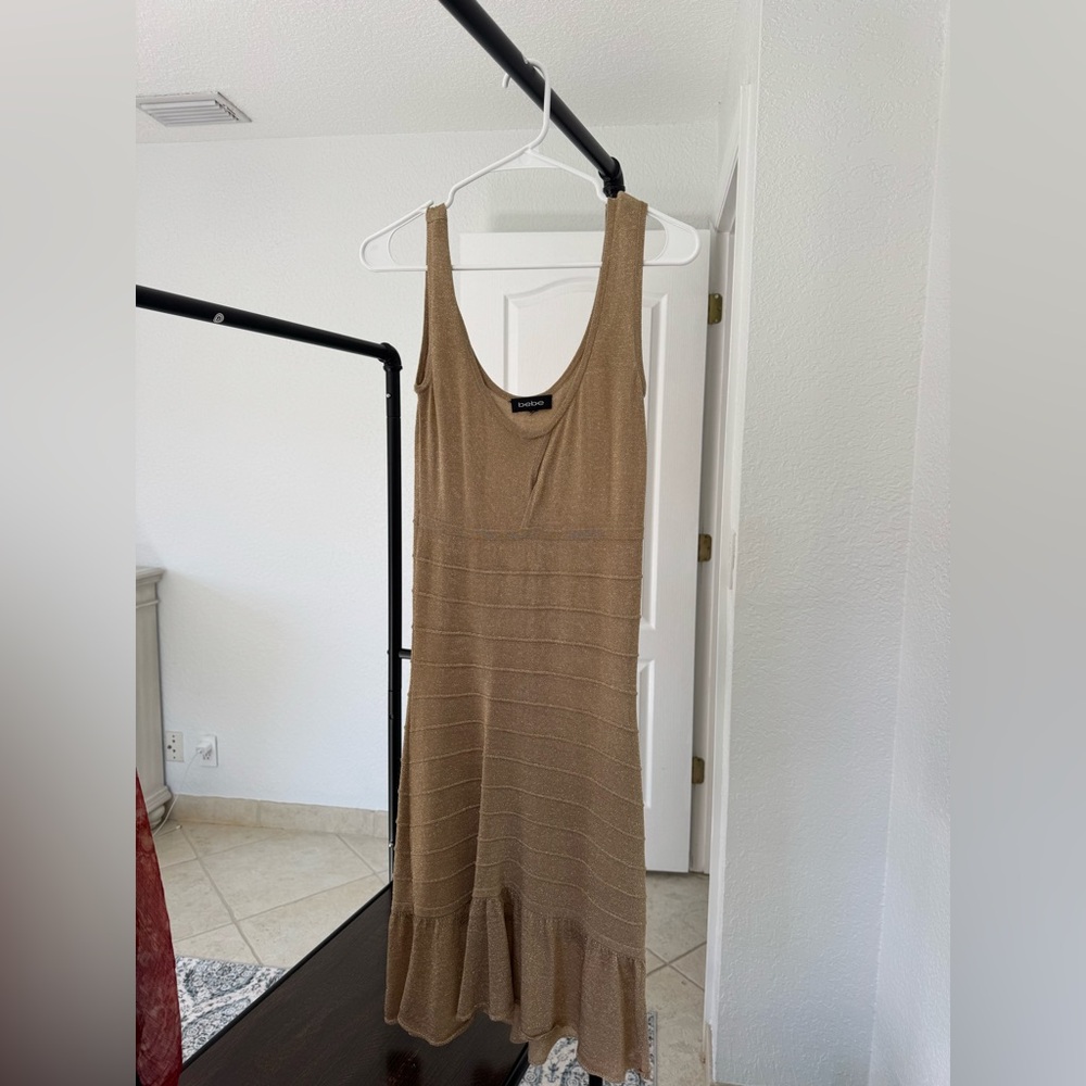 Gold bebe mini cocktail dress fits size XS/S lightly used excellent condition